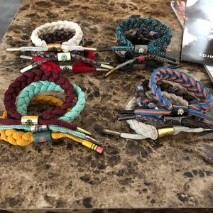 12 used Rastaclat bracelets